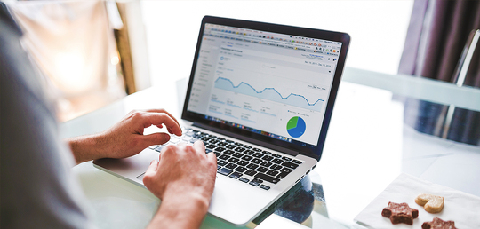 Image of Man Working on Analytics